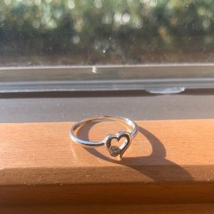 Heart shaped ring with diamond
